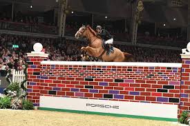 Address the grand hall, olympia way, hammersmith, london, w14 8ux. Laura Renwick Wins Olympia Puissance That Wall Is Huge Horse Country Tv