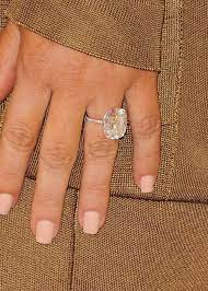 You Won T Believe What Kanye West Had Engraved In Kim Kardashian S Stolen Engagement Ring Kim Kardashian Wedding Ring Huge Engagement Rings Expensive Engagement Rings