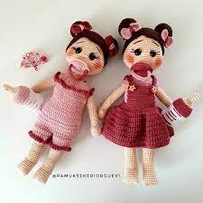 instagram da pamuk sekeri orgu evi ister tulumlu ister elbiseli hem emzikli hem biberonlu hemi de bol alyanakli 2 8 yas aras orgu yastiklar biye