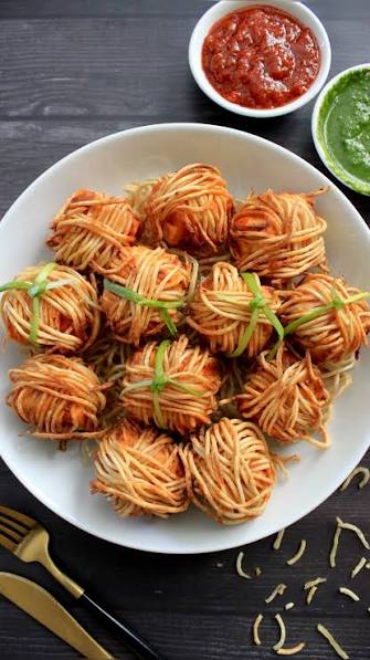 Paneer Sutli Bomb , This restaurant famous Thread paneer/Paneer Sutli Bomb is a fun Indo Chinese fusion snack. One bite, and it’s a flavor explosion !💥, Ingredients , 2 Tbsp Schezwan sauce , 2 Tsp ...