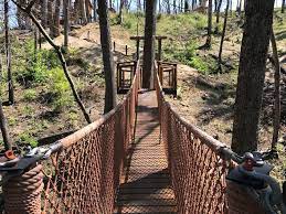 The hour self guided tour begins at base camp at foxfire mountain then crosses 70 feet above little pigeon river on the 350' swinging bridge to prosperity mountain where you may hang your wish,(wishing strips provided, to blow in the winds of prosperity mountain. Anakeesta In Gatlinburg Tn Everything You Need To Know