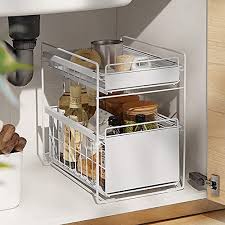 Rather than packing everything under the sink on the cabinet floor or on kitchen counter tops, consider these. Under Sink Organizer Under Sink Shelf Under Sink Storage Kitchen 2 Tier Sliding Basket Stackable Cabinet Organizer For Under The Sink Space Saving Solution In Kitchens Bathrooms White Black Buy Online At Best