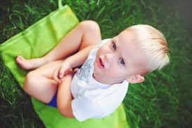 Happy little brother playing hugs his sister baby, boy and girl embraces ,  concept love and parenting — Stock Photo © lanarus-foto #183990590