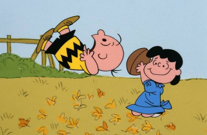 Charlie Brown falling for the football trick, AI generated