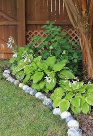 It can also protect flower beds from grass invasion and create a retainer for groundcover such as gravel, pebbles, wood chips, mulch and more. 50 Great Garden Edging Ideas For Your Backyard Plants And Diy Designs