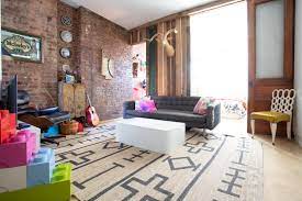 This Family Of Four S 500 Square Foot Apartment Feels Much Larger Living Room White Bedroom Nook Apartment