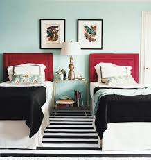 White kitchen is enlivened by pops of royal blue. I Love This I Love Black And White Stripes I Love Contrasts The Light Turquoise With The Red And Black Guest Bedroom Decor Bedroom Design Red Headboard