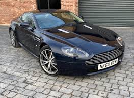 Image result for Midnight Blue 2011 Aston Martin
