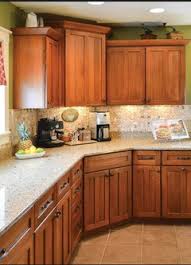 Sage green kitchen with oak cabinets. Sage Green Walls Oak Cabinets Backsplash