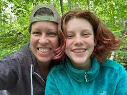 What is the volunteer plant growing through my shrub?