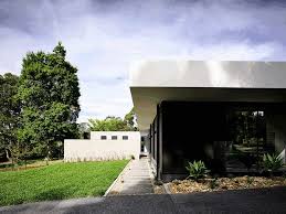 It is the buyer's responsibility to find out special requirements, such as what alternative building is allowed in your county or what you have to do to get houses permitted. L Shaped Modern House In Melbourne By Inform Design
