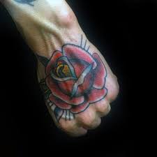 Top 71 Simple Hand Tattoo Ideas 2021 Inspiration Guide Tattoo of rose flower in human skeleton hand isolated on white background. top 71 simple hand tattoo ideas 2021