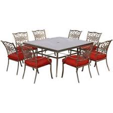 Hampton Bay Oak Cliff 7 Piece Outdoor Dining Set With 4 Stationary 2 Swivel Chairs And Chili Cushions 176 411 7d V3 The Home Depot Outdoor Dining Set Patio Dining Furniture Glass Top Dining Table