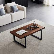 Saltoro sherpi contemporary style wooden coffee table with slightly rounded shape, dark brown. 17 Stories Minimalist Coffee Table Black Metal Frame With Walnut Top Square Coffee Table Wayfair