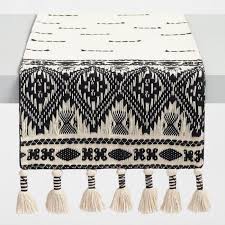 Black And White Table Runner Full Of Detail Including Embroidery An Intricate Tribal Art Inspired Diamond Border And Oversized Tassels Our Wov Boho Table Runner Table Runners Table Cloth