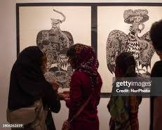 Image of vibrant art exhibition in a Tehran gallery