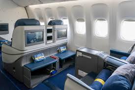 The aircraft's quiet and cosy cabins are equipped with comfortable reclining seats, contemporary sky interior (international). First Impression Ukraine International Airlines 777 Business Class