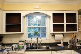 Measure the length of the cabinets that you are going to cover with the fabric covering and transfer that to the actual. Fabric Backed Open Kitchen Cabinets Diy On A Dime The Tutorial Pretty Handy Girl