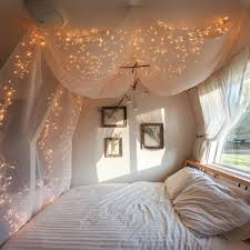 Attach a row of japanese lanterns or fairy lights along the top of the wall where the ends of the ceiling drapes meet the columns. Nine Creative Ways To Use String Lights In The Bedroom Apartment Therapy