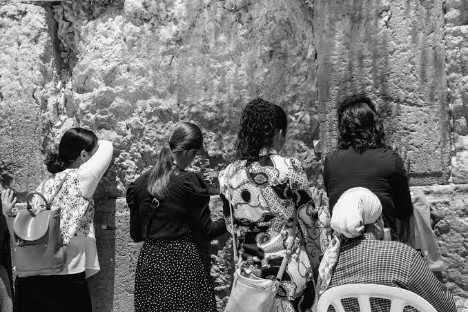 Customer viewing insurance discounts earned through wearable activity