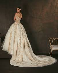 C160 Elsa Ball Gown Wedding Dress By Amare Couture Weddingwire Com Ball Gown Wedding Dress Wedding Dress Couture Gold Wedding Gowns