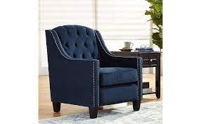 It features the wooden base, brass nail heads, and yellow sectional sofa and brown ending table, with brown living room chairs look fantastic against a. Amazon Com Tivoli Bella Ink Blue Velvet Tufted Armchair 55 Downing Street Furniture Decor