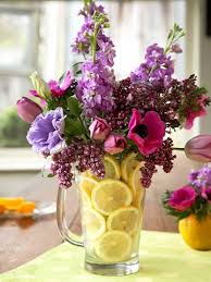 Flowers in a mason jar! How To Use Fruit In Your Diy Flower Arrangements