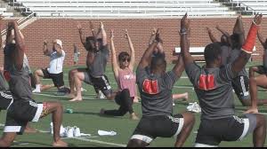 Sport yoga football ball soccer silhouette gym bike car. Mercer Football Adds Yoga Into Offseason Workouts 13wmaz Com