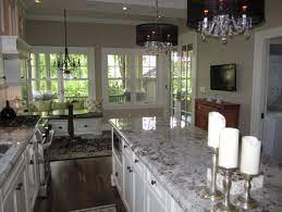Whether you choose to have a white granite kitchen countertop, white granite vanity top or any other structure, the natural stone will give your space a touch of light and life to your space. Alaska White Granite White Granite Countertops Granite Slabs