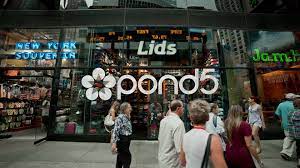Lids Hat And Baseball Cap Store In Times Square Manhattan New York City Nyc Stock Footage Cap Store Times Baseball Cap Store Lids Hat Baseball Cap