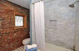 Shower units white marble bathroom marble shower modern shower design en suite bathroom en suite marble bathroom marble tub marble bathrooms 4k00.10modern minimalist bathroom interior design with simple glass walk in shower, mirror and white ceramic sink on empty black marble tiled. 14 Best Exposed Brick Bathroom Ideas Brick Bathroom Exposed Brick Bathroom Exposed Brick