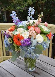 Flower Arrangement With Gerber Gaisies Stock Delphinium Ranunculus Roses Brassica Anemone Flower Arrangements Fresh Flowers Arrangements Flower Delivery