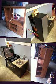 Diy Upcycle Tv Entertainment Stand Into Kids Play Kitchen We Used To Have This Same Entertainment Center Kids Play Kitchen Diy Play Kitchen Diy Kids Furniture