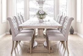 A rustic chandelier of distressed wood or metal with candelabra bulbs is a must in a traditional french country dining room. 6 Hamptons French Dining Rooms To Inspire You