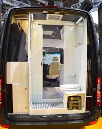 The Sprinter S Rear Houses A Bathroom With Integrated Wardrobe Closet Mercedes Sprinter Camper Mercedes Van Sprinter Camper