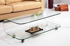 The table itself is a straightforward and refined piece of furniture that includes a wicker hammock underneath the glass top. Innovative Cool Ideas Of Modern Coffee Tables