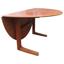 The table ships fully assembled and can easily go from a setup dining table to a single drop leaf to completely folded down. Danish Teak Round Drop Leaf Dining Table Circle Dining Table Drop Leaf Dining Table Round Extendable Dining Table