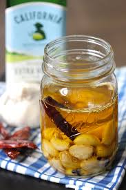Garlic Confit This Recipe Can Be Used To Go On Pizza Pasta And Mashed Potatoes It Makes A Great Olive Oil Homemade Pickles Confit Recipes Pickling Recipes
