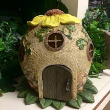 Make a sunflower solar fairy house using das clay and empty bottle. Garden Fairy Sunflower House Irish Crossroads