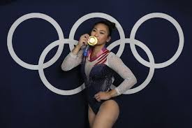 The tokyo olympics lee flipped and twisted from bar to bar in a sparkly blue leotard. Bph2pr Hggagim