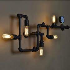 I've used hardware in some unique ways before, like turning an industrial light bulb cage into a modern tiki torch. Loft Vintage Water Pipe Wall Lamp 5 Lights Bar Restaurant Iron Industrial Style E26 E27 Edison Bulbs Retro Wall Sconce Lamp Heparts