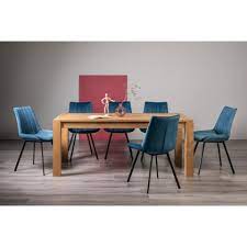 You'll find sets at bob's for under $500 for a dining table and chairs, and up to $4,300 for beautiful. Blake Light Oak Fontana Large Dining Set Modern Design Home Origins
