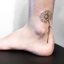 We have daisy tattoo ideas, designs, symbolism and we explain the meaning behind the tattoo. 150 Daisy Tattoo Ideas To Show Your Feminine Side