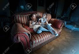 Sofa bed nudi kvalitet, moderan dizajn namještaja, dekoracija i aksesoara za domaćinstvo svjetski poznatih brendova. Photo Of Two Girls Fighting For Tv Remote On Sofa At Night Stock Photo Picture And Royalty Free Image Image 33988999