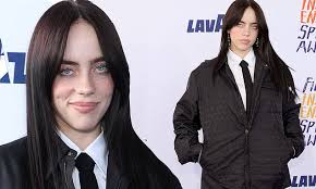 Billie Eilish shows off her cool style in an oversized black suit while  attending the 2024 Film Independent Spirit Awards in Santa Monica