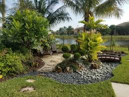 Asian Themed Landscape Garden With A Tropical Touch Hope You Like Www Universallandscapefl Com Landscape Backyard Area Zen Garden Design