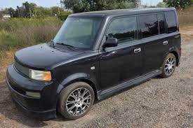 Image result for Black Mica 2005 Scion