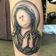The wistful gaze of jesus christ's mother offers. Tattoosnob Com Tiny Face Virgin Mary Tattoo By Facebook
