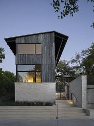 La Technique Du Bois Brule Ou Shou Sugi Ban Uppett Architects Hillside Project Bois Brule Maison Grange Moderne Murs Peints En Noir