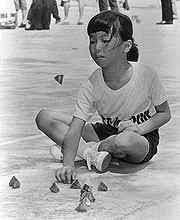 Whilst throwing a stone, pick up one stone and catch the stone in the air before it falls to the ground. Childhood Games Childhood Games Singapore Singapore Photos